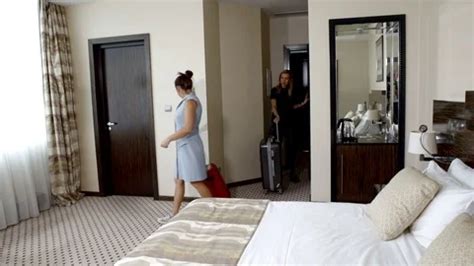 lesbian video|Two girls lesbian checking in to the hotel room. Vacation together。